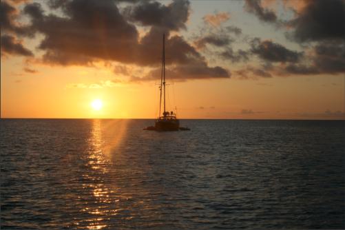 sunsets right in the middle of the ocean