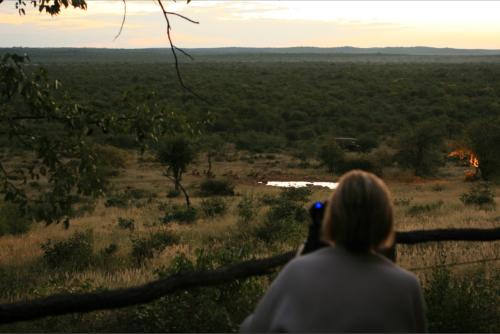 Britta videoing the lions from our veranda